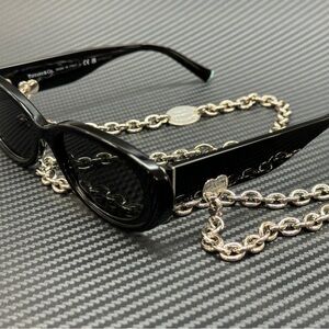 Tiffany & Co. Black Sunglasses with Silver Chain new in case. Other colors.